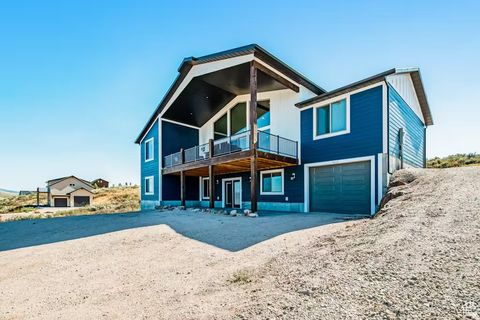Photo of 2869 S CHUKAR DR #63, Garden City, UT 84028 (MLS # 2158904)