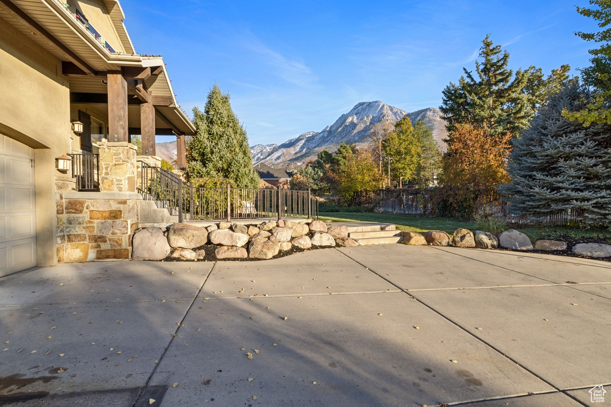 BACK TO SCHOOL PRICE IMPROVEMENT* This extraordinary Holladay estate offers a rare combination of seclusion, luxury, and breathtaking mountain views. Nestled in a private, serene .60 acre, this one-of-a-kind property features 5 spacious bedrooms, 4 bathrooms, and an array of elegant living spaces. This exceptional property boasts a large, flat yard with endless potential - perfect for creating your dream outdoor oasis! Whether you envision a luxurious pool, expansive gardens, or a spacious play area, the possibilities are endless. This unique property is the perfect blend of luxury, privacy, and opportunity. Whether you're hosting guests or enjoying quiet time with family, every inch of this home has been thoughtfully designed to create an atmosphere of elegance and relaxation. This is truly an incredible opportunity for those seeking a luxury home in one of Holladay's most prestigious neighborhoods.