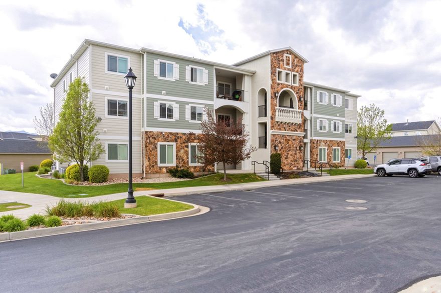 Assumable 5.125% USDA loan available to qualified buyers - significant monthly savings vs. today's rates! Move-in ready 3 bed, 2 bath condo in Hillcrest with stunning Wasatch mountain views. This unit features an open layout, granite counters, stainless appliances, primary suite with walk-in closet, in-unit laundry, and a private balcony. HOA covers water, sewer, trash, internet, snow removal, and exterior maintenance, plus pool, clubhouse, gym, and playground. Detached 1-car garage included. Quick access to Lehi tech corridor. Square footage per county records; buyer to verify all info.