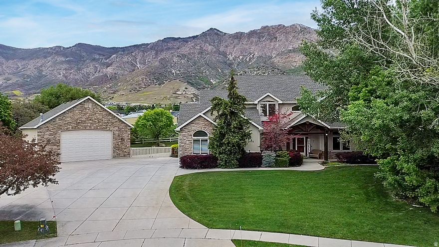 Beautiful lodge pole design home with stunning mountain views! Open floor plan with abundant natural light and great flow for everyday living and entertaining. Spacious kitchen and living areas, plus comfortable, well-designed bedrooms. Basement has been used for short-term rental and bookings can be transferred if wanted. Oversized 2-car attached garage plus an impressive 32' x 40' detached 4-car garage with a half bathroom. Enjoy mountain views and peaceful surroundings in a desirable North Ogden location close to outdoor recreation, and amenities. A rare find with unique style and exceptional garage capacity!