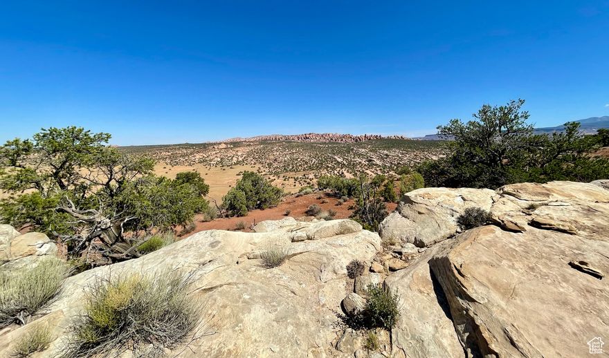 Enjoy endless out-of-this-world views from 11.49 acres situated atop your own private cliff, within the Bridger Jack Mesa community of Moab, UT. Unobstructed vista encompasses Behind the Rocks, snow capped La Sal Mountains and Canyonlands Nat?l Park. Dark night skies provide outrageous star gazing like you?ve never seen before. As a primary residence or weekend getaway, your dream property awaits. Rarely do pristine parcels like this become available. Power and high speed internet are available right by the driveway entrance, ready for your imagination. Property comes with water rights.