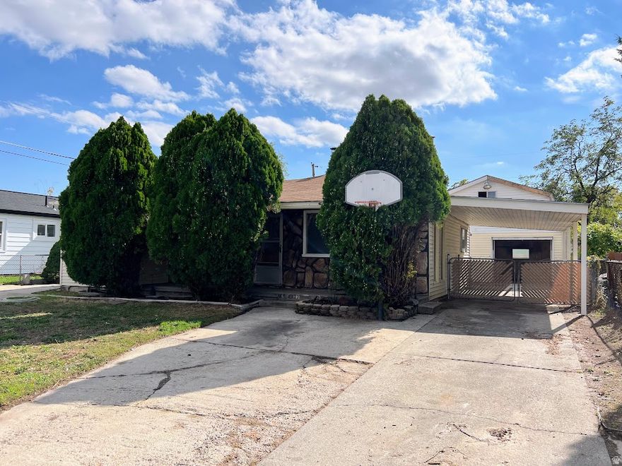 Best Deal on a 5 bedroom home in all of Salt Lake County! Large Master Suite with Jetted Tub & it's own back patio. Huge Garage that has an upstairs with over 6 ft ceiling height. Tons of Parking. Multiple carports. Double Driveways. New Carpet. New Kitchen Stainless Steel Range. 2 Fireplaces. New Bath Vanity. Fridge & Washer/Dryer are included. Covered Front Porch. No FHA Loans.