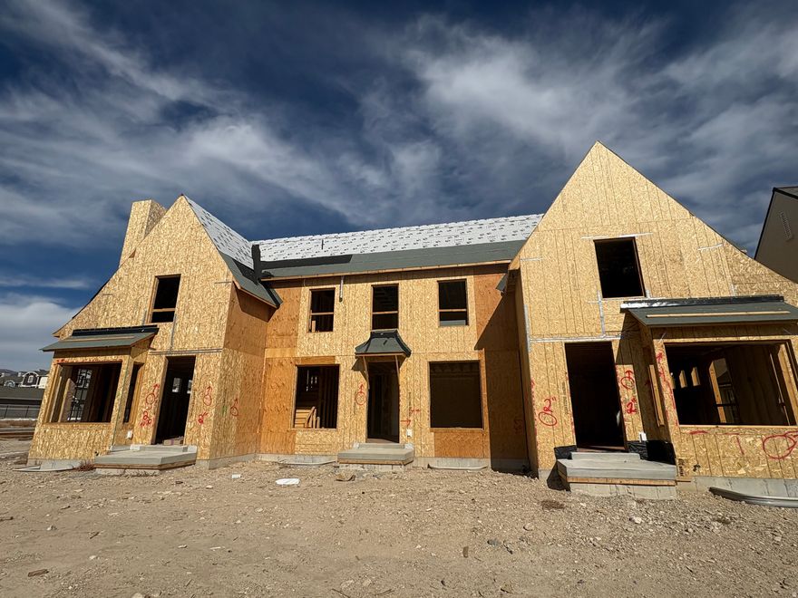 Welcome to Camden Commons, a charming English-inspired hamlet nestled on the northern edge of Herriman City. Designed around a shared green space, this intimate community encourages a strong neighborhood feel with space for recreation, connection, and relaxation. Enjoy easy access to schools, grocery stores, restaurants, and retail-all just a short walk away. Drawing inspiration from London's garden suburbs, these townhomes-crafted by Bradford R. Houston Design Studios for Goodboro Come tour this beautiful 3-bedroom home today-with the option for a small private fenced yard! Also comes with an unfinished basement for extra storage!