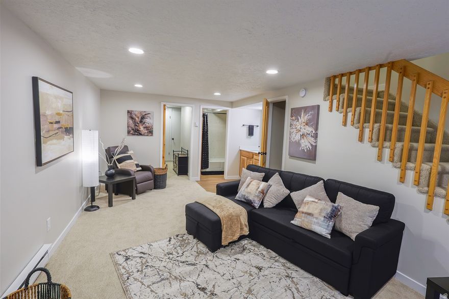 Maximize your lifestyle and your income with this spectacular, fully updated 2-bedroom, 2-bathroom condo at Wolf Lodge in Eden, Utah. This is the ultimate turnkey investment or second home, as it is approved for short-term rentals and sits adjacent to the Wolf Creek Golf Course, offering breathtaking mountain and valley views. The 1,152 sq ft unit has been completely refreshed, new flooring, a cozy fireplace, and a fully equipped kitchen.  HOA provides resort-style amenities that attract renters, including a heated community pool, hot tub/spa, sauna, gym, and tennis courts, while covering essential services like snow removal and all utilities (water, sewer, trash). Its unparalleled location is an outdoor paradise; the Powder Mountain shuttle picks up at the corner. Powder Mountain is closest (10-minute drive) on powder days, quick access to Snowbasin (20-minute drive), and summer watersports on Pineview Reservoir (10-minute drive). Don't miss this opportunity to acquire a flexible, amenity-rich property in a prime recreational setting.