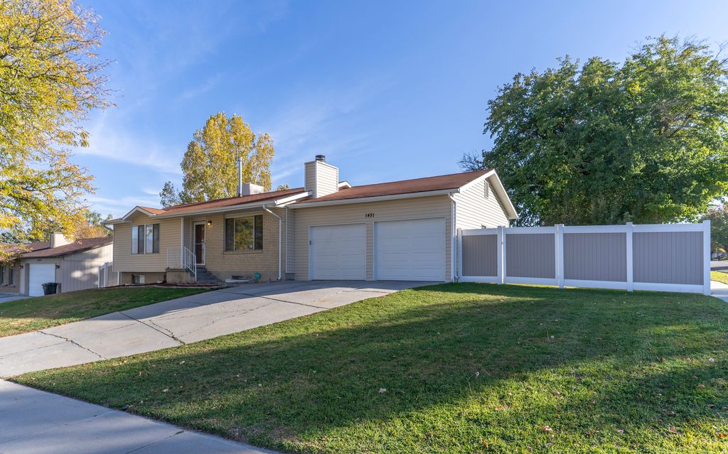 Photo of 1451 W BLUEMONT DR S, Taylorsville, UT 84123 (MLS # 2124789)