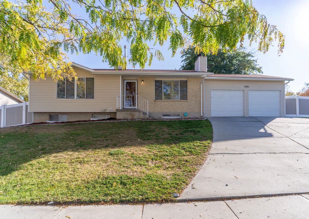 Photo of 1451 W BLUEMONT DR S, Taylorsville, UT 84123 (MLS # 2124789)