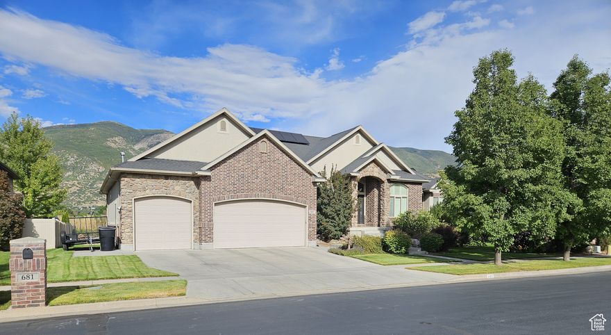 Nestled on the highly sought-after Country Lane in Farmington, this stunning custom-built home offers a perfect blend of luxury and comfort. Designed with thoughtful upgrades throughout, it features a spacious grand master suite, a bright and open great room ideal for entertaining, and six large bedrooms. The finished basement includes a versatile game room and home theater, perfect for relaxing or hosting guests.