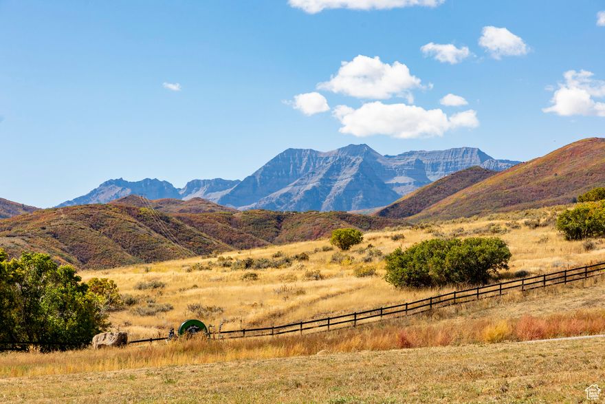 Estate lot with magnificent views of Mt. Timpanogos, Deer Creek Reservoir, Soldier Hollow GolfCourse and Olympic Venue. This 6+ acre lot is on Greenbelt for tax purposes and currently being farmed. It borders State Park Property along the south border with quick access to state park amenities. Minutes from Soldier Hollow Golf Course, Provo River fly fishing, and boating and other water sports on Deer Creek Reservoir. Build your dream home on this lot with panoramic views of the entire valley. It is flat to gently rolling and ideal for most any architectural style.