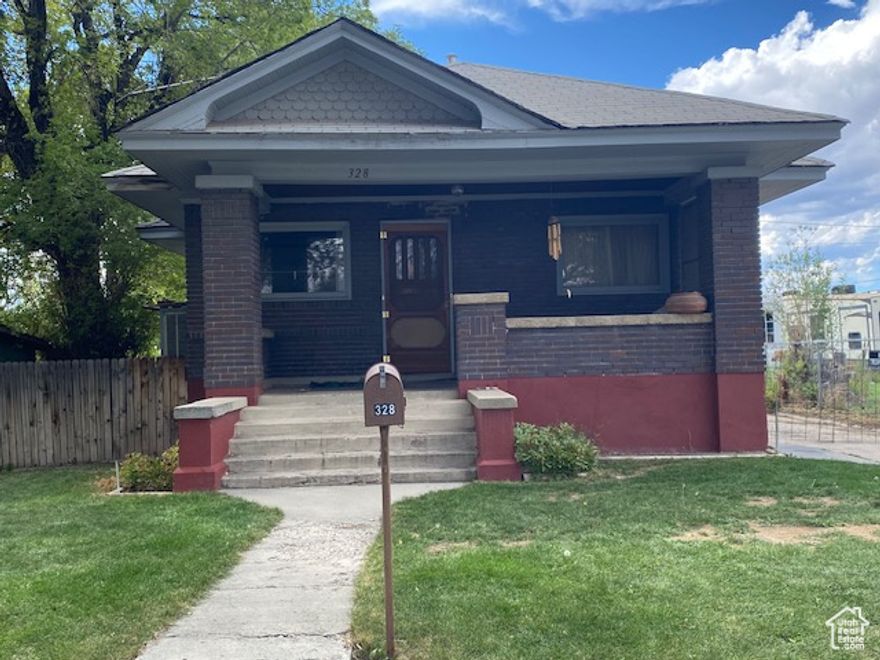 Square footage figures are provided as a courtesy estimate only and were obtained from county records.  Buyer is advised to obtain an independent measurement.  CHARMING 1924 HOME WITH ORIGINAL WOODWORK ON A SPACIOUS LOT.  Step back in time with this 1924 home, full of character and timeless charm.  Featuring original woodwork throughout. 3-bedrooms, 1 bath, dining area, cozy living spaces and classic architectural detail that reflect the home's rich history.  Enjoy relaxing on the large front porch, perfect for morning coffee or evening sunsets.   Whether you're looking for a place to make your own or a home vintage charm, this property has endless potential. 8 shares of Price Water company is included in this sale