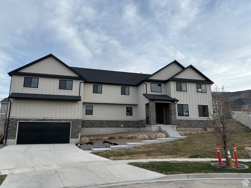 *Finished basement* Welcome to your dream home! This newly built house features an open floor plan, 9 ft. ceilings through out, custom cabinets, tons of storage space on each level, insulated/finished and extra tall garage, laminate flooring on both the basement and main floor, and much more. It also has an beautiful view of the lake and mountains. Square footage figures are provided as a courtesy estimate only and were obtained from Building plans. Buyer is advised to obtain an independent measurement. **Agent owned listing**