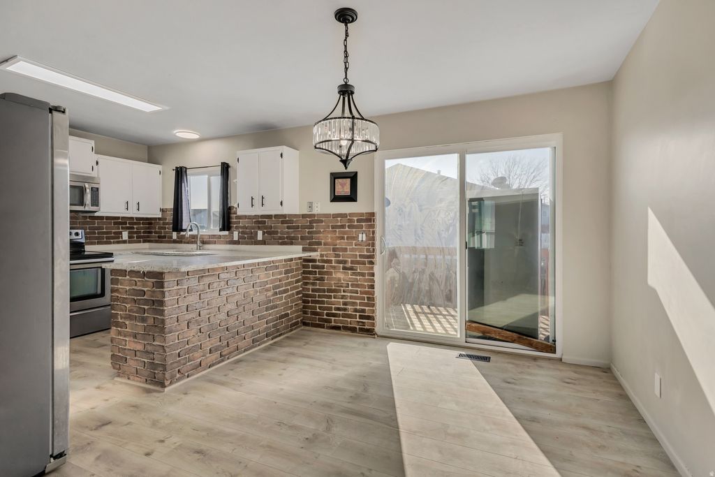 Photo of 7571 W ADAMS RD S, Magna, UT 84044 (MLS # 2131458)