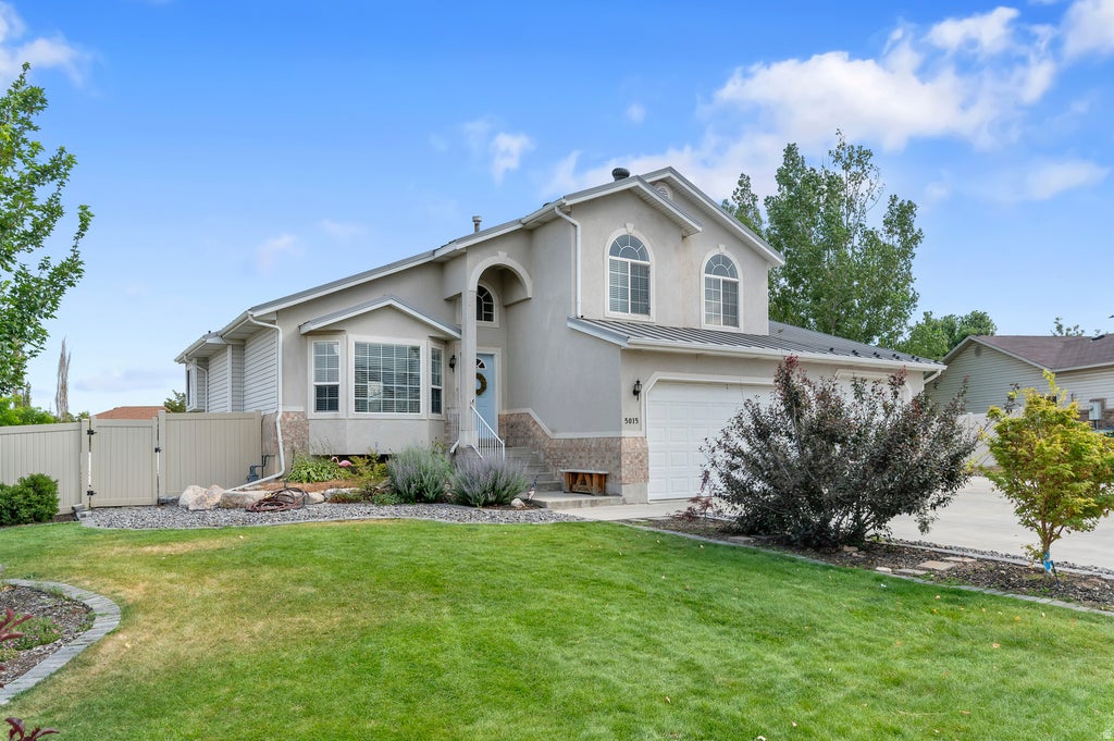 Photo of 5015 W ROCK RIDGE LN, West Jordan, UT 84081 (MLS # 2172025)