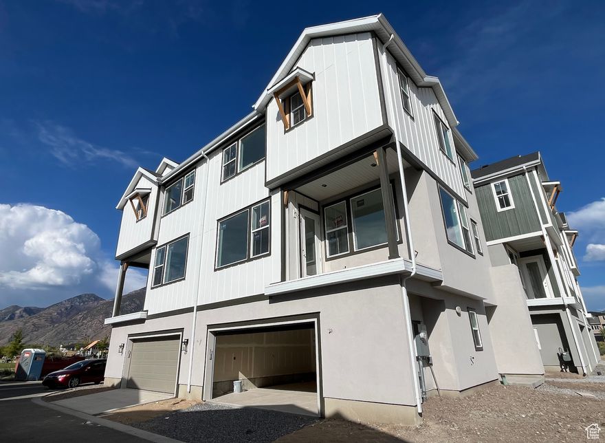Up to $15,000 in seller paid closing costs or towards rate buydown!! Model home hours are Tuesday-Saturday from 10am-5pm, see video link for virtual tour or ask about our self guided tour option! This stunning 3-bedroom, 2.5-bath twin home nestled in one of Springville's most desirable neighborhoods. Step inside to discover an inviting open-concept layout featuring soaring 10-foot ceilings, an abundance of natural light, and a seamless flow between the kitchen, living, and dining areas-ideal for both everyday living and entertaining. The modern kitchen boasts elegant quartz countertops, stainless steel appliances, and a spacious island, while the dining area opens directly onto a private deck with amazing views. With only one shared wall and plenty of windows, this home feels more like a single-family residence, offering privacy and a bright, airy atmosphere throughout. Located just steps from a brand-new city park and surrounded by scenic walking trails, this home offers the perfect blend of convenience, comfort, and outdoor beauty! This unit is currently under construction, estimated completion mid-end October 2025.