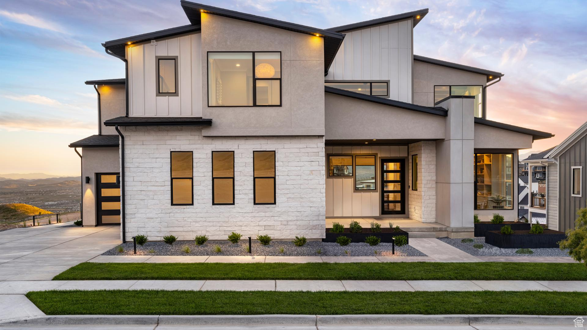 You must see this highly sought-after Fairbanks model home with panoramic views of the Valley, Utah Lake, and the Wasatch Mountains! Stunning architecture designs and upgrades galore both inside and out! The Fairbanks' welcoming stepped covered entry flows into the two-story foyer, with views of the two-story great room and desirable luxury outdoor living space beyond. The well-equipped kitchen overlooks a bright formal dining room, and is enhanced by a large center island with breakfast bar, ample counter and cabinet space, and sizable walk-in pantry. The stunning primary bedroom suite is enhanced by an enormous walk-in closet and deluxe primary bath with dual vanities, large soaking tub, luxe glass-enclosed shower with seat, linen storage, and private water closet. Spacious secondary bedrooms feature roomy walk-in closets, one with private full bath, the other with shared full hall bath with separate vanity area. Additional highlights include a generous second floor loft; versatile flex space off the dining room; convenient powder room, everyday entry, and drop zone off the foyer; centrally located laundry; and additional storage. This professionally decorated model home with all furniture and decor included in sale! Make an appointment today to tour this stunning model home!