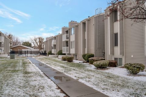 Photo of 875 E ARROWHEAD LN #42, Murray, UT 84107 (MLS # 2130231)