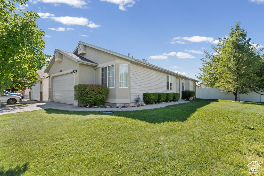 Photo of 6717 S EMPRESS LN, West Jordan, UT 84081 (MLS # 2189519)