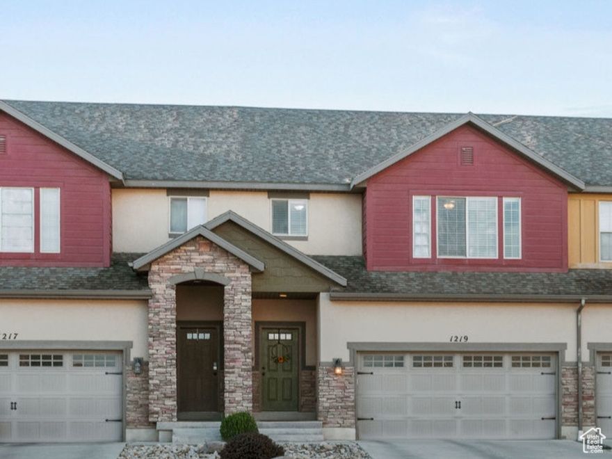 RARE FIND...A place to build your own equity that includes a fenced yard & TWO CAR Garage! High ceilings & lots of light make this feel like a detached single family home. You'll love the updated paint & carpet throughout & open concept living. And don't miss the huge 800 sq ft storage space, it's 6' tall! Turf in the backyard is also designed for pets!Within walking distance to every kind of store, restaurant & entertainment you'd ever need! You are welcome to park in the driveway for showings.