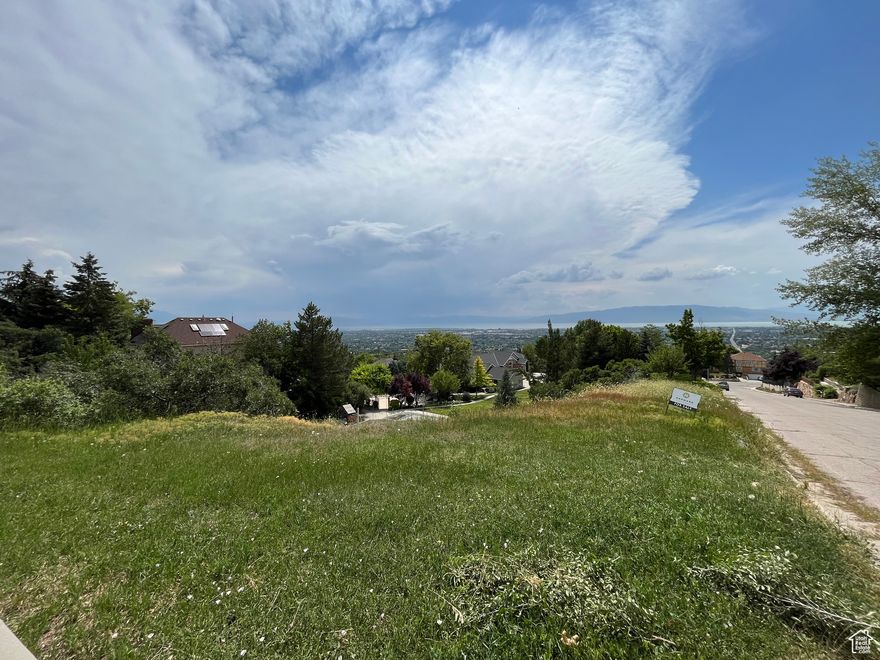 This is one of the most unique and desirable lots left in Provo. Located in an established neighborhood on Hillside Drive, this property offers absolutely exceptional, unobstructed views of Utah Valley, the lake, and surrounding mountains. All engineering and prep work completed-ready to build. Includes professionally designed custom home plans if you'd like. Peaceful, private setting just minutes from BYU and Provo Canyon. Located in a quiet, upscale neighborhood with no HOA. This lot is truly one of a kind.