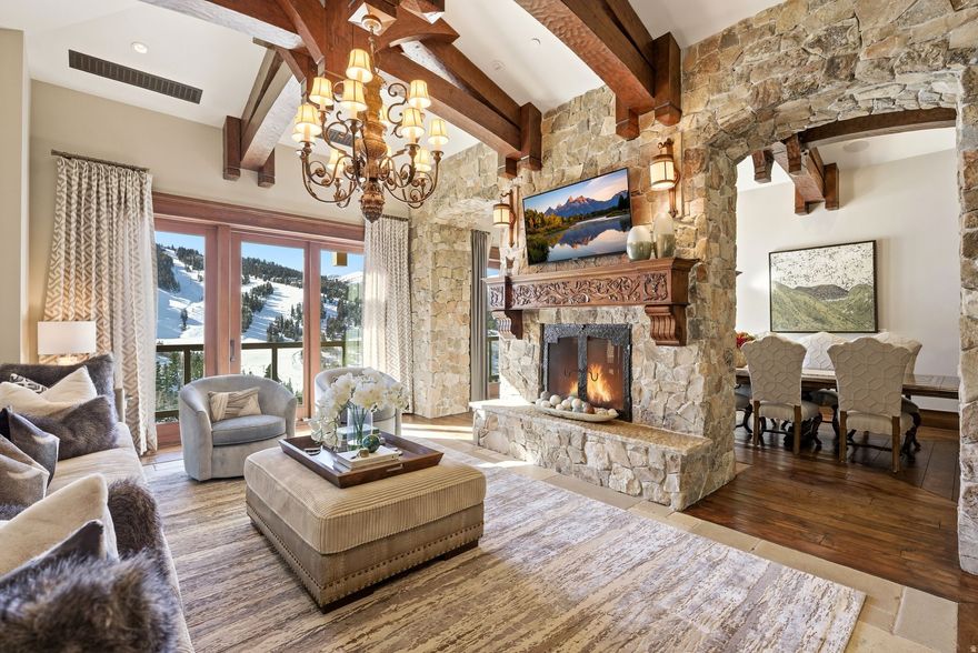 One-of-a-kind penthouse at the St. Regis Deer Valley. Offering 6468 square feet of living space with vaulted ceilings and panoramic ski area views of the slopes of Deer Valley and Wasatch & Uinta mountains. In addition to the 6468 square feet of living space, there is 1500+ square feet of rooftop deck space and 5 balconies. This grand and spacious penthouse residence is a must-see. Located on the 11th floor of the St. Regis Deer Valley, this unique property offers stunning views and incredible privacy. The kitchen is a chef's dream, fully equipped with 4 Wolf ovens, a 6-burner Wolf range/griddle combination, 30-inch Sub-Zero freezer and refrigerator, plus a prep kitchen/butler pantry with a dishwasher, Wolf range and oven, and a Sub-Zero refrigerator/freezer. The bar, temperature-controlled wine room, and billiards room offer a fantastic space for entertaining, and the informal and formal living and dining areas provide ample room and flexible ambiance for whatever the occasion. The primary bedroom features its own private office and incredible bathroom suite with two water closets, a steam shower with two shower stations, and two walk-in closets with stunning craftsmanship. There are 3 additional guest suites and 1 bunk room, all offering ensuite bathrooms. Benefits of ownership and amenities at the St. Regis also include world-class Ski Access, Ski Butler services, Valet services, a pool, fitness center, multiple restaurants and bars, a top golf swing suite, and more. As an owner at the St. Regis Deer Valley, you also enjoy exclusive gate access into the Deer Crest community, making coming and going from your residence to the Heber Valley private airport or the SLC international airport incredibly convenient. This property is truly one of a kind and a must-see.