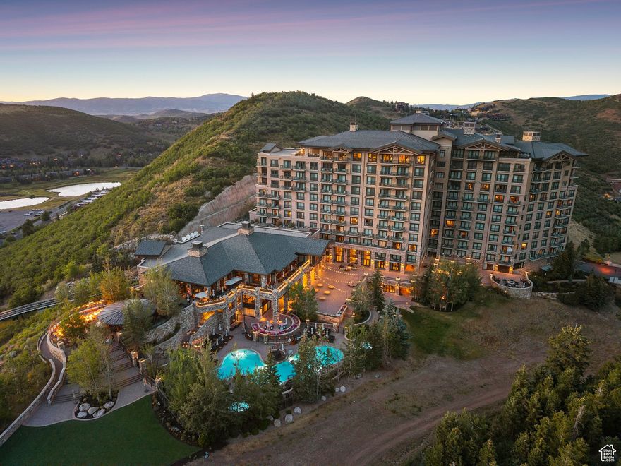 One-of-a-kind penthouse at the St. Regis Deer Valley. Offering 6468 square feet of living space with vaulted ceilings and panoramic ski area views of the slopes of Deer Valley and Wasatch & Uinta mountains. In addition to the 6468 square feet of living space, there is 1500+ square feet of rooftop deck space and 5 balconies. This grand and spacious penthouse residence is a must-see. Located on the 11th floor of the St. Regis Deer Valley, this unique property offers stunning views and incredible privacy. The kitchen is a chef's dream, fully equipped with 4 Wolf ovens, a 6-burner Wolf range/griddle combination, 30-inch Sub-Zero freezer and refrigerator, plus a prep kitchen/butler pantry with a dishwasher, Wolf range and oven, and a Sub-Zero refrigerator/freezer. The bar, temperature-controlled wine room, and billiards room offer a fantastic space for entertaining, and the informal and formal living and dining areas provide ample room and flexible ambiance for whatever the occasion. The primary bedroom features its own private office and incredible bathroom suite with two water closets, a steam shower with two shower stations, and two walk-in closets with stunning craftsmanship. There are 3 additional guest suites and 1 bunk room, all offering ensuite bathrooms. Benefits of ownership and amenities at the St. Regis also include world-class Ski Access, Ski Butler services, Valet services, a pool, fitness center, multiple restaurants and bars, a top golf swing suite, and more. As an owner at the St. Regis Deer Valley, you also enjoy exclusive gate access into the Deer Crest community, making coming and going from your residence to the Heber Valley private airport or the SLC international airport incredibly convenient. This property is truly one of a kind and a must-see.
