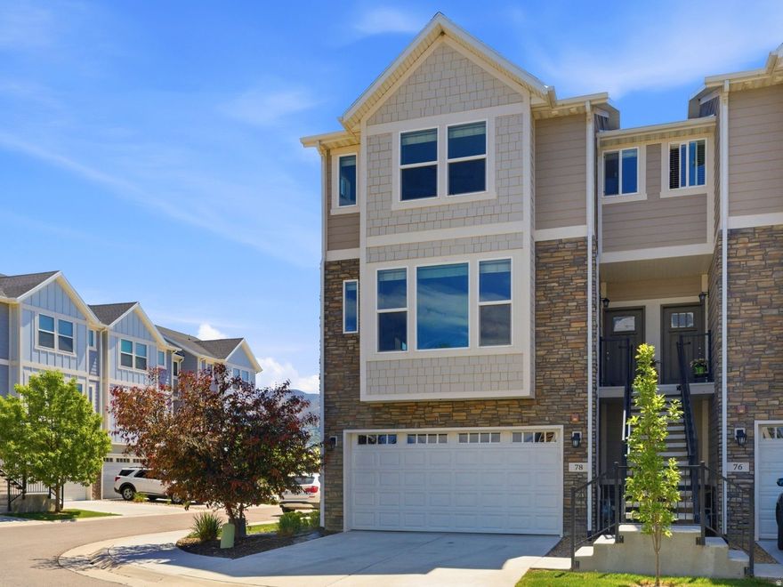 **Seller willing to contribute up to $12,000 towards Closing Costs or a rate buy down with acceptable offer.** Stylish townhome in Draper Creekside filled with bright natural light and mountain views. This desirable layout features a main-level bedroom and full bathroom, offering added flexibility and convenience. Recently updated with fresh paint and brand-new carpet throughout. The inviting living spaces include luxury vinyl plank flooring, polished Silestone countertops, and stainless steel Whirlpool appliances, including the refrigerator. Additional upgrades and amenities include custom 2-inch blinds, tall 9-foot ceilings, an oversized two-car garage, a private patio and deck, and a fully fenced backyard perfect for relaxing or entertaining. *Square Footage is provided as a courtesy only. Buyer is advised to obtain an independent measurement and verify all information.*