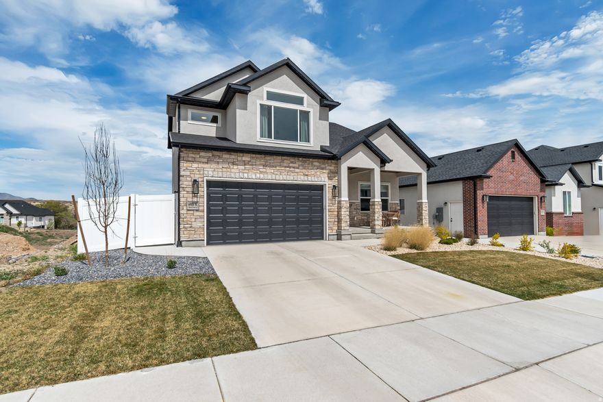 Welcome to this stunning, like-new 2024-built home in the Hidden Oaks community of Herriman. This home has all the beauties.; Quartz countertops, hard surface through out main level, tile bath and shower surrounds, upgraded lighting, stainless steel appliances, large windows and beautiful views. Nestled in the charming community of Herriman this home provides convenient access to a variety of amenities including schools, shopping, restaurants and recreation opportunities. Fully fenced and landscaped, there is no hassle with this turn key home.