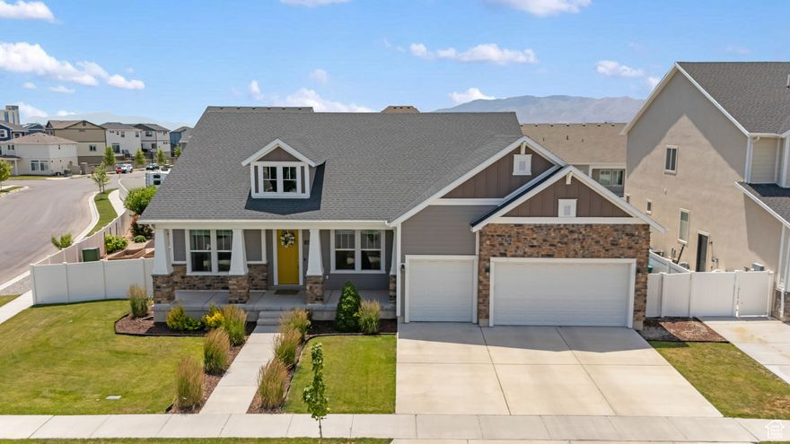 Nestled on a quiet corner lot in the highly sought-after Holbrook Farms community in Lehi, sits your new home! This thoughtfully designed, spacious rambler offers main-level living including a serene master suite with a spa style soaking tub and large walk-in closet, an ensuite perfect for guests, a third bedroom or office space, a separate full bathroom, a modern kitchen with granite countertops, stainless steel appliances and a large island. Enjoy the 10-foot ceilings and large windows that let in the perfect amount of natural light. Downstairs you will find there's a spacious rec/movie room, two additional bedrooms and another full bath. There is also an unfinished area for you to make into a home gym, studio, large storage area or a sixth bedroom. Take a step outside and enjoy the well-maintained front yard to the low maintenance backyard that is full of charm and perfect for hosting guests, relaxing or gardening. This home also features a large three car garage, is near I-15, Primary Children's Hospital, the Jordan river trail and so much more. This home truly offers something for everyone. Welcome home!!