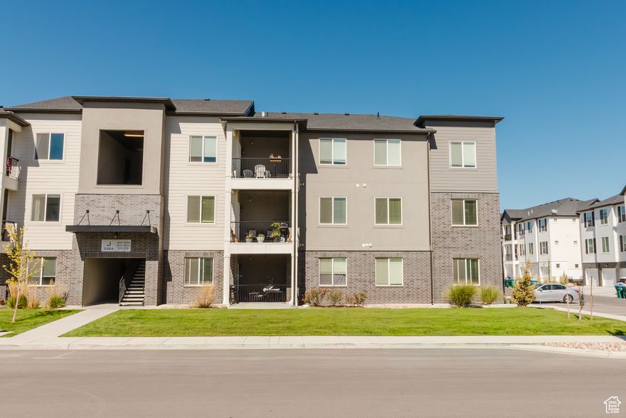 Welcome to your new home in Lehi! This condo was built with care, and it shows. With tall ceilings and an open layout, the whole place feels bright, spacious, and easy to love the moment you walk in.  The kitchen is both stylish and functional, with sleek quartz countertops and plenty of room to cook, entertain, and gather. Step out to your covered patio-the perfect place to relax or catch an evening sunset.  An attached 1-car garage adds convenience and security, and the solid build quality means you'll enjoy this home for years to come.  Whether you're a first-time buyer, an investor, or just looking for a low-maintenance lifestyle in a great location, this Lehi condo has it all!