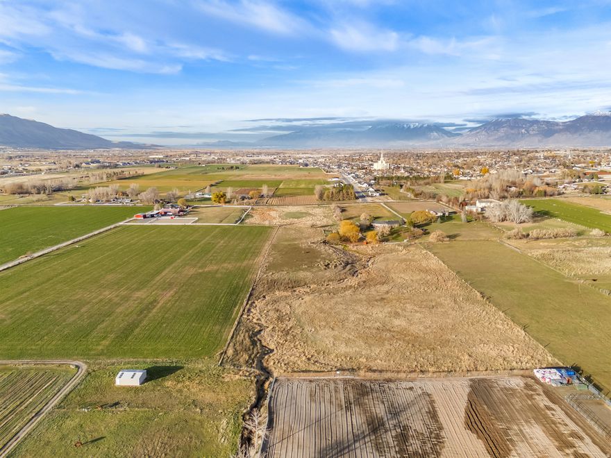 10.78 Acres. Rare Opportunity to own beautiful ground like this! Bring the horses and enjoy stunning mountain and valley views from every angle. The perfect spot to build your dream home. Property will have it's own access road off of 12000 south. Parcel# 30:089:0031 is included (access road).