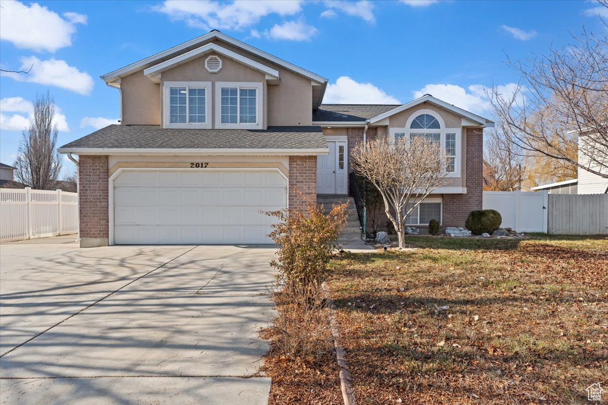 This charming home boasts 4 bedrooms, 3 bathrooms, 2 family rooms, one of which features an electric fireplace and a versatile flex room that provides an ideal space for a home office. The extra-large primary suite includes two separate closets for ample storage. Freshly painted throughout, the home showcases a beautifully remodeled kitchen complete with granite countertops and brand-new appliances. Additional highlights include a two-car attached garage equipped with an EV charging outlet and RV parking conveniently located alongside the garage with plenty of space for extra vehicles, an RV, boat or trailer. Recent upgrades enhance comfort and efficiency, such as a new roof installed in 2021, fully paid off solar panels, a tankless water heater and a newer water softener. This home is conveniently situated next to a walking trail and just a short distance from shopping and dining.