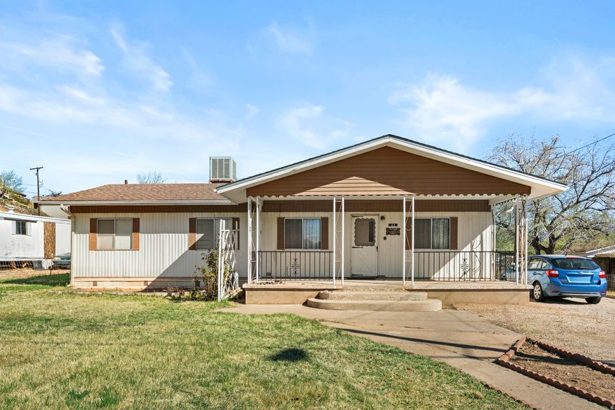 Affordable opportunity with potential! This 2 bed, 2 bath 1977 Hillcrest mobile home offers 1,056 sq ft on a spacious 0.22-acre lot with pressurized irrigation. Features include natural gas heat, central A/C, a small workshop, and plenty of room for RV or extra parking. The home needs updating but could shine with some TLC--great for investors or buyers looking to customize. Roof-mounted evaporative cooler is not hooked up. Sold As-Is and priced accordingly--bring your ideas and make it your own!