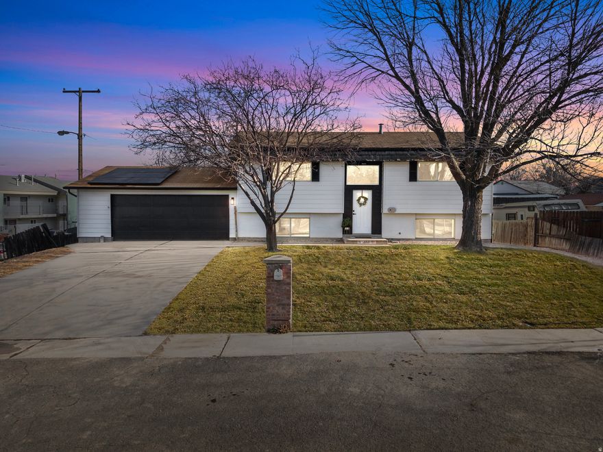 Beautifully updated home in an excellent location, close to shopping, dining, and everyday amenities. This move-in-ready property features durable LVP flooring, brand new carpet, and stylish quartz countertops. The kitchen and bathrooms have been updated with high-end finishes, offering a modern and elegant feel throughout. The basement includes a separate apartment with its own private entrance-perfect for guests, rental income or multigenerational living. Enjoy a huge yard and tons of parking, providing ample space for entertaining, recreation, and multiple vehicles. Square footage and acreage figures are provided as a courtesy estimate only and were obtained from the county records and previous listing. Buyer is advised to obtain independent measurements.