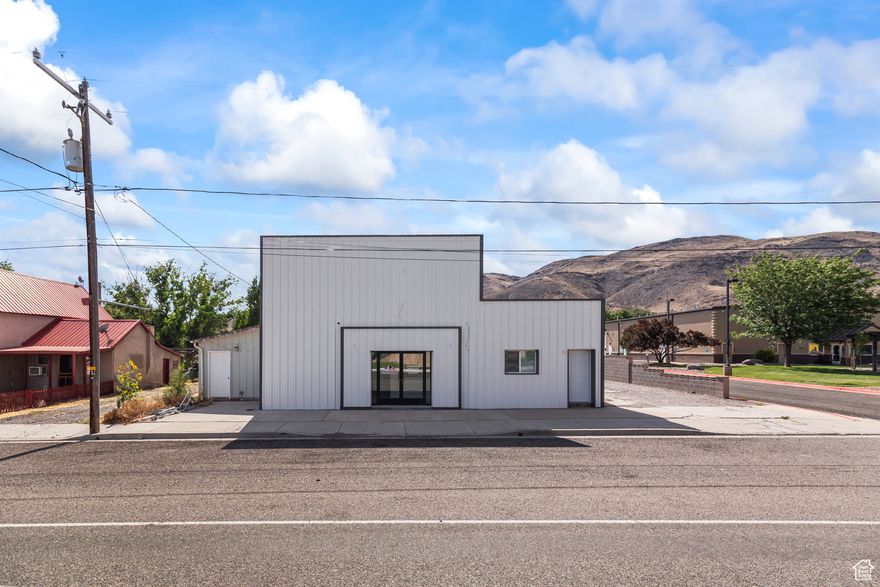 Newly remodeled commercial facility in the heart of Elsinore with recent extensive upgrades! This property now features 5 new private offices, new bathrooms, and a dedicated contractor service desk. Shop buildings offer ample space for operations. Nearly every major system has been updated: new roof, all-new exterior sheeting, full electrical rewire with new panel, upgraded HVAC with mini splits and furnace, new plumbing, high-efficiency insulation, LED lighting throughout, and a brand-new septic system. Interior improvements include epoxy shop floors, new carpet in offices, custom millwork, break room upgrades, and a full security system. Fiber optic internet and a centralized server room support modern business needs. Move-in ready and built to perform - this is a rare turn-key commercial opportunity. Ample frontage, great traffic exposure, and close proximity to I-70 make this an excellent hub for business. Don't miss your chance to secure a solid piece of Central Utah real estate with endless potential!