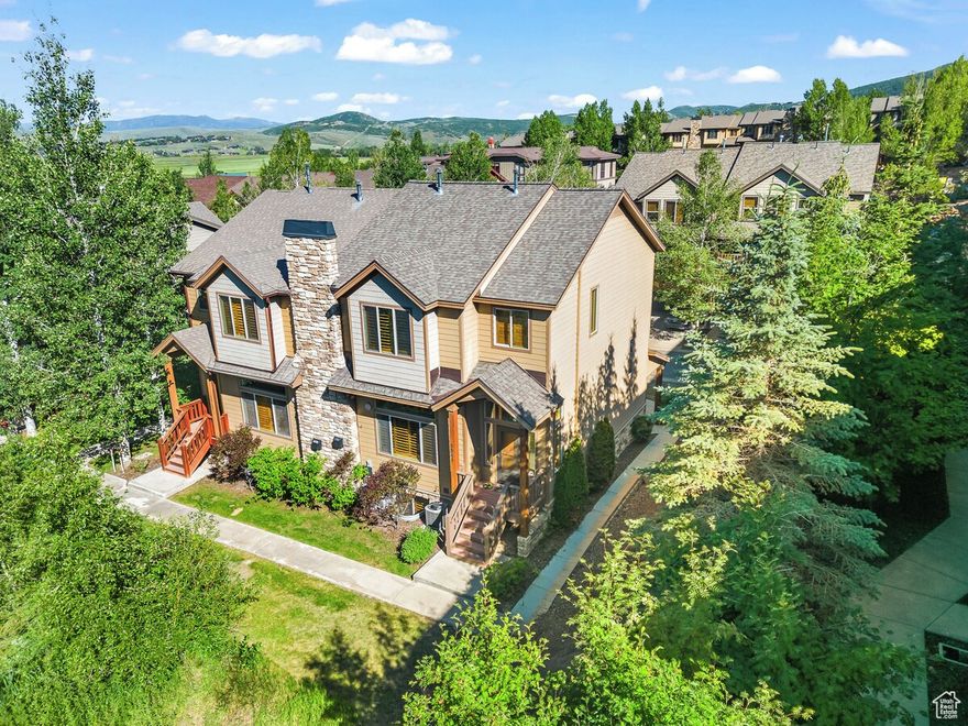 Highly Desired Townhouse - Prime Location & Amenities The perfect blend of luxury and comfort. End unit, overlooking wetlands, just below Olympic Park. Open floor plan, cathedral ceilings, chef's kitchen optioned, huge counter space, custom cabinetry and breakfast bar for causal dining. Main floor opens to private deck with large Hot Tub, Natural gas BBQ and additional dining. 4 well-appointed bedrooms and spacious loft including a generous primary suite with walk-in closet, jetted soaker tub and attached shower. Easy walk to the Millennial Trail leading to Redstone shopping, restaurants etc. Ideal as primary residence or vacation property. Nightly Rentals permitted. Low HOA fees.  On Free Bus Route.