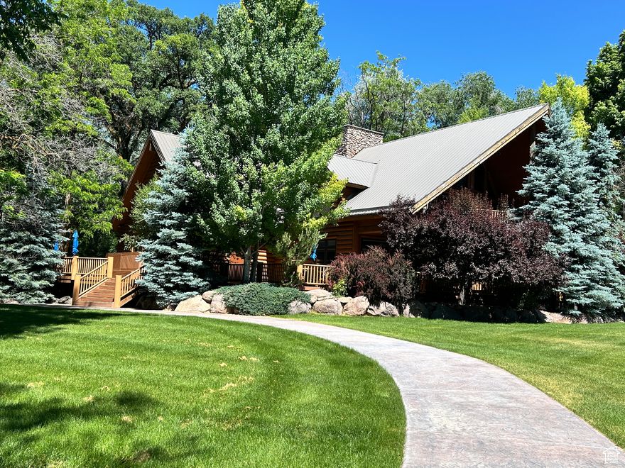 Fabulous Lodge, built as a Trophy wildlife museum complete with murals, flora and fauna.  The property could be converted to a single family residential use or house a caregiver. A 520 historical home is located on the property.  Extra parking for museum visitors.  Includes trophy animals, furnishings, patio furniture.  Includes trophy animals, patio furniture, furnishings, excluding Elephant tusks, Rhino horn, bronzes, Zebra chair, painting supplies, pool table, dining table & chairs, desk & chair, and personal items.