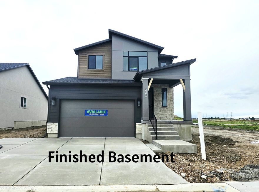 Built on one of the larger lots in the community and with a finished basement this is one to check out! This modern 2 story under construction is in the JDC Ranch community which is planned with lifestyle in mind, featuring playgrounds, walking trails, parks, and pickleball making it easy to enjoy the outdoors right in your own neighborhood. The home is designed with functionality in mind with an open concept main level including a spacious kitchen with ample cabinetry and dedicated dining space. Upstairs you'll find 3 bedrooms and 2 bathrooms including the primary suite with separate tub/shower and dual vanity sinks. The basement is finished with 1 more bedroom and bathroom and a secondary living room. Closets are abundant throughout the home for all your storage needs. Front yard landscaping and a fence is included along with lender incentives through builders preferred lenders.