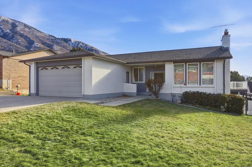 Welcome to 2192 E High Mesa Dr, nestled in one of Sandy's most sought-after neighborhoods at the base of the majestic Wasatch Mountains. Set on a rare -acre lot with breathtaking mountain views, this property offers a unique blend of space, serenity, and endless potential-just minutes from world-class ski resorts, scenic mountain trails, and canyon access. This 5-bedroom, 3-bath home features a distinctive design with soaring vaulted ceilings, expansive windows that flood the space with natural light, two charming fireplaces, and multiple large living areas that feel both warm and inviting. The updated kitchen (2017) is ideal for any home chef, while the thoughtful layout provides flexibility for a variety of lifestyles. Step outside to an expansive backyard-a true blank canvas ready for your vision. Whether you dream of adding a detached garage with an ADU, a pool, or creating a private equestrian setup, this property delivers. Zoned to allow up to two horses with direct access to Dimple Dell riding trails, this is a rare opportunity for those seeking space and freedom without sacrificing convenience. A deck added in 2018 provides the perfect place to relax, entertain, and soak in the stunning mountain views. The beautifully landscaped, tree-lined yard includes a sprinkler system installed in 2020 and added gravel for easy maintenance and year-round enjoyment. Notable updates include: 2017: Kitchen renovation, exterior paint 2018: New roof, deck installation, primary bathroom remodel 2019: Basement flooring, backyard gravel 2020: Sprinkler system installation 2021: Hall bathroom remodel, full interior/exterior repaint 2024: New water heater Located just a short walk to Lone Peak Elementary and Indian Hills Middle School, this home offers the perfect balance of mountain tranquility and everyday convenience.  Square footage figures are provided as a courtesy estimate only and were obtained from county records. Buyer is advised to obtain an independent measurement.