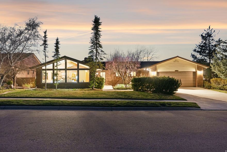 Stunning ranch style brick home with fantastic mid-century modern architectural accents. This coveted Holladay neighborhood is nestled at the base of Mount Olympus offering truly inspiring views. Very spacious and inviting floor plan. The main living area showcases vaulted ceilings and dramatic floor-to-ceiling windows, filling the home with natural light and framing the surrounding mountain views. Beautifully updated kitchen open to cozy family room with fireplace. Large primary suite with walk-in plus two additional closets and bathroom with separate tub/shower. Features up to 8 bedrooms or the option for multiple home offices, studios, or creative spaces to suit a variety of needs. Family room downstairs with wet bar and walkout to back yard. Enjoy all the fun outdoor spaces including swimming pool, covered balcony, and patios. Amazing potential for hosting inside and out. Two separate HVAC systems for enhanced temp control, water softener, upgraded wood frame windows/sliding doors, tons of storage. This is just one of those homes that you know is quality right when you pull up. It has been exceptionally well cared for and upgraded. Incredible location with lightning quick access to freeway, Millcreek Canyon, and Olympus Hills Shopping Center. Also convenient to U of U, Park City and Cottonwood Canyons.