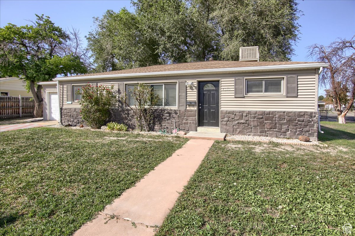 Charming Mid-Century Rambler in Prime Kearns Location. This beautifully maintained single-level home features 3 bedrooms, 2 bathrooms, and a blend of classic mid-century charm with fresh updates throughout. Recent improvements include new carpet, fresh interior paint, and a brand new roof with ridge cap-offering peace of mind for years to come. Inside, you'll find a spacious and flexible floor plan perfect for families, home offices, or guest accommodations. The home's solid construction and timeless design provide the perfect canvas for modern living.Located in a desirable Salt Lake City neighborhood, you'll enjoy easy access to downtown, nearby parks, schools, and convenient freeway access-ideal for commuters and families alike.Don't miss this rare opportunity to own a home full of character and potential in a highly sought-after area.