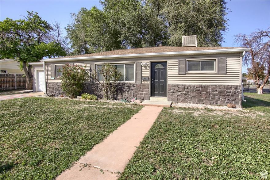 Charming Mid-Century Rambler in Prime Kearns Location. This beautifully maintained single-level home features 3 bedrooms, 2 bathrooms, and a blend of classic mid-century charm with fresh updates throughout. Recent improvements include new carpet, fresh interior paint, and a brand new roof with ridge cap-offering peace of mind for years to come. Inside, you'll find a spacious and flexible floor plan perfect for families, home offices, or guest accommodations. The home's solid construction and timeless design provide the perfect canvas for modern living.Located in a desirable Salt Lake City neighborhood, you'll enjoy easy access to downtown, nearby parks, schools, and convenient freeway access-ideal for commuters and families alike.Don't miss this rare opportunity to own a home full of character and potential in a highly sought-after area.