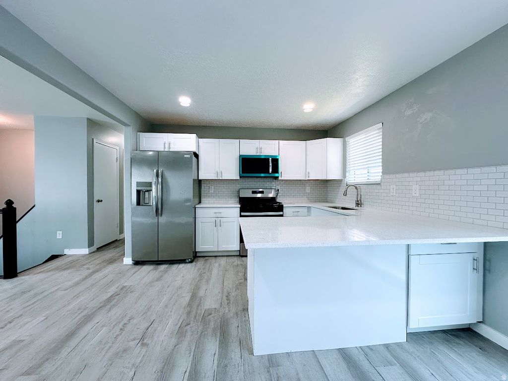 Photo of 2562 N 1150 W, Layton, UT 84041 (MLS # 2152333)