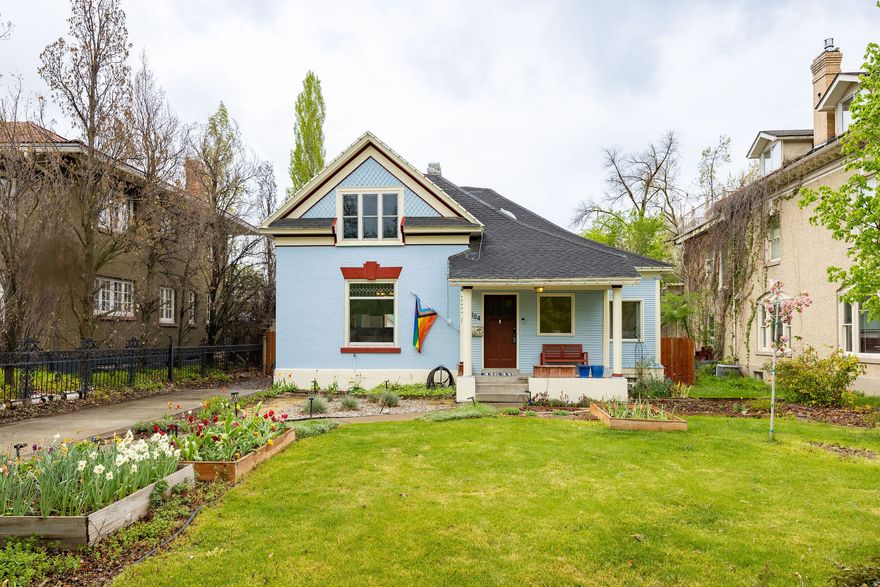 Historic charm in this downtown Logan home. Located in an ideal spot: walk to restaurants, theaters, shopping and parks. The interior features  hardwood floors, huge windows, an open-concept living space with natural light, four bedrooms, and two updated bathrooms. The kitchen has been recently updated. Backyard is complete with a large entertaining deck, mature trees and privacy, dedicated garden boxes, charming flower gardens, and a detached garage.  The home has plenty of storage, solar panels (paid off), a new gas fireplace and is vacant and easy to show.  Don't miss this gem.  Buyer to verify all information.