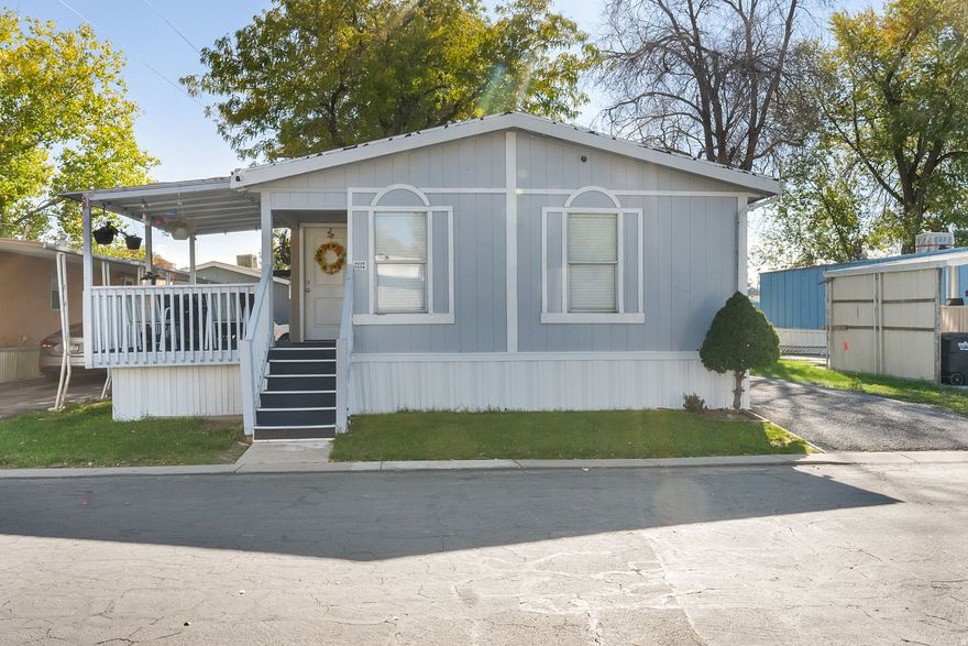 Welcome to this beautifully maintained mobile home in the heart of West Valley City! This charming residence offers comfortable and affordable living with an open floor plan, spacious living area, and plenty of natural light throughout. The kitchen features ample cabinet space and flows seamlessly into the dining area-perfect for gatherings and everyday living. Enjoy a generous primary bedroom and additional bedrooms ideal for family, guests, or a home office.  Located in a quiet and well-kept community close to schools, shopping, dining, and freeway access, this home offers both comfort and convenience. Don't miss your chance to make it yours!