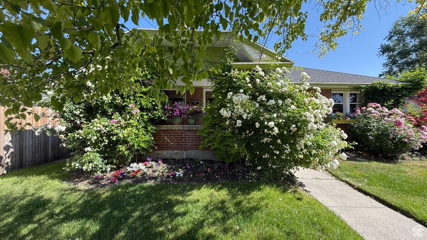 Charming 1925 Brick Bungalow with Fireplace and Cozy Front Porch This 1,509 sq ft bungalow offers timeless curb appeal, original stained glass windows, valuable upgrades including central air conditioning, and a spacious two-car garage. Manicured landscaping frames the home with a rose garden, mature trees, and wisteria vines that provide beauty and privacy. A fully fenced yard adds both security and function.  Inside, sun-filled living spaces and abundant windows highlight the home's classic charm. The main floor features two well-sized bedrooms, while the basement offers flexible space for storage, hobbies, or an additional bedroom. The backyard is a blank canvas-ready for your personal garden, patio, or outdoor retreat.  Set in a vibrant neighborhood, you'll love being within walking distance of restaurants, shops, TRAX, and Salt Lake City's cultural core. A perfect blend of vintage charm and thoughtful updates-schedule a showing today and make it your own.