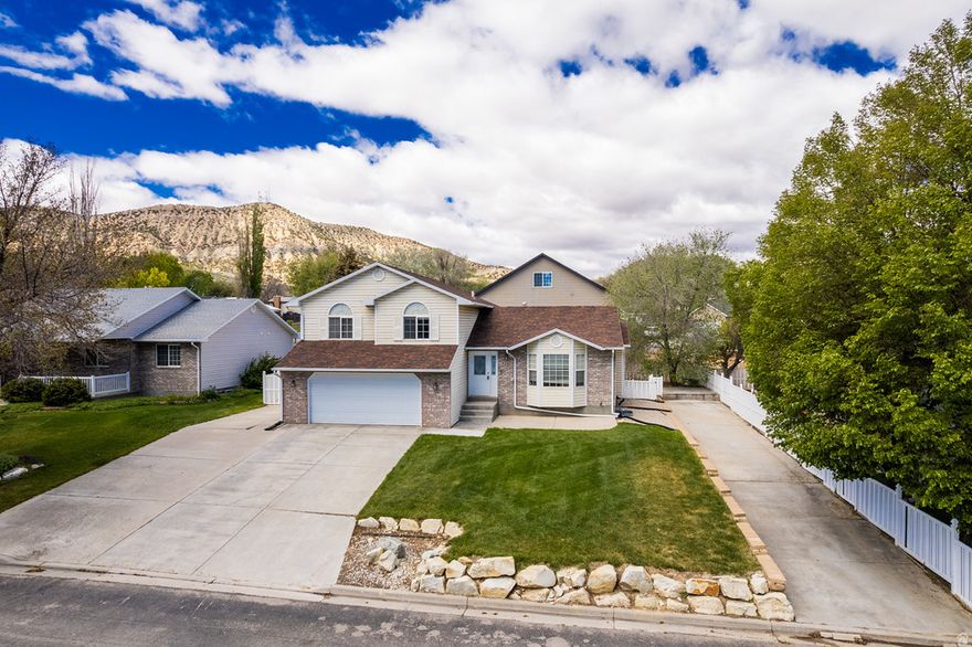 BEAUTIFUL HOME COMING FULLY FURNISHED!! Welcome to this move in ready multi-level home located in Cottonwood Heights. Offering comfort and flexibility for a variety of lifestyles. Featuring owned solar panels, no HOA, attached 2 car garage, covered patio, central air, forced-air gas heat, vaulted ceilings, and additional parking. Basement was previously set up for  short term rental use with separate living area, kitchenette style amenities, sleeping space, work area, and entertainment features. Buyers are advised to verify all