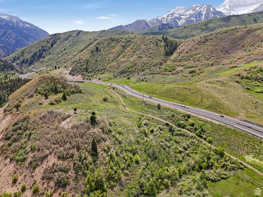 Private, gated-access compliments mile-above-you views in Utah's most scenic alpine canyon on this 5.4 acre property. Includes a deeded water right [55-13607 (a50568)] for a residence and attendant irrigation plus access to a spring and/or well sites. Passed soil percolation test, surveyed, and power lines have been run on the edge of the property. No HOA, no CCRs. The easement to the river is a huge plus for anglers of famed Hoover's Hole, tubers, kayakers and people who simply like watching a river go by.