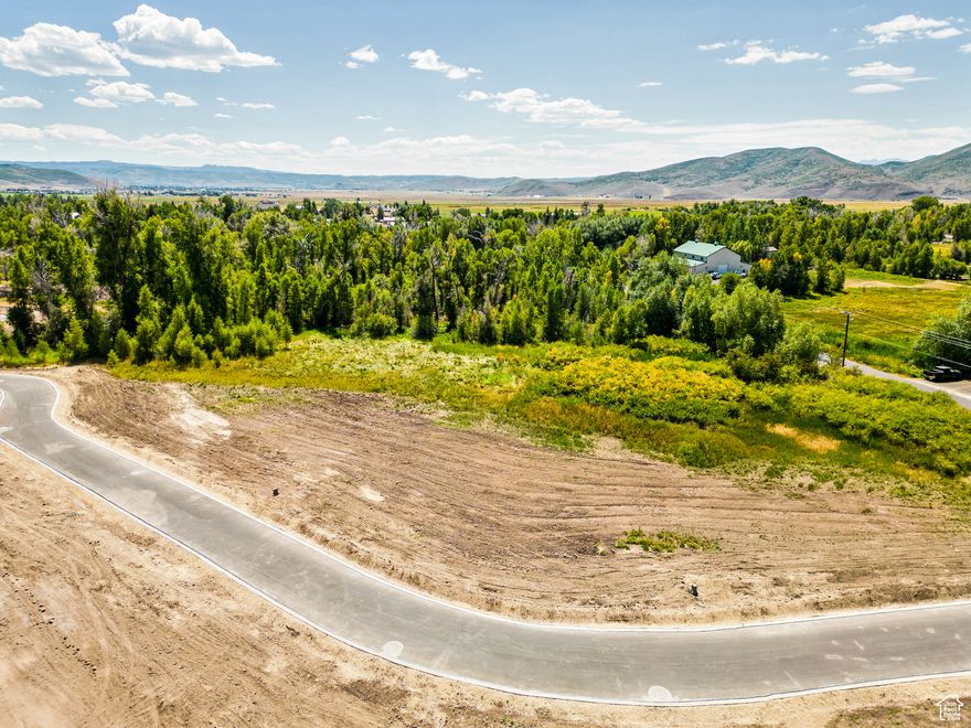 Infrastructure is now complete. Developer incentives apply to the next 3 sales. Call for details. River Haven Retreat is for those seeking a graceful escape from the rush of city life-where the focus shifts from chasing to simply being. Here, 16 fully improved and thoughtfully planned single-family homesites share rare access to the Weber River, offering a lifestyle rooted in nature, serenity, and intention. All of the lots present a flat building envelope, with the flexibility to build at your own pace and even incorporate an attached ADU. At River Haven, slowing down becomes second nature, and the connection to land and community is unmistakable. When it calls to you, you'll know you've found more than a homesite-you've found your haven. Call list agent for developer incentives.