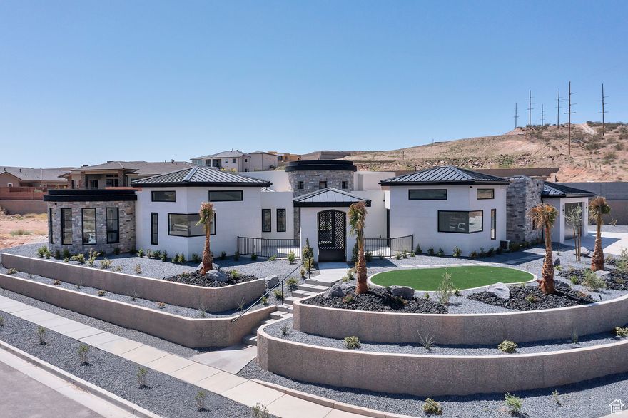 Welcome to your dream home, a stunning 3-bedroom, 3-bathroom and an office showcasing paramount views! This estate is nestled in one of the most sought-after neighborhoods. This magnificent residence boasts 3,771 square feet of meticulously designed living space, offering the perfect blend of elegance, comfort, and modern amenities. As you step through the impressive front door, you are greeted by a spacious foyer with soaring ceilings that sets the tone for the entire home. The state-of-the-art chef's kitchen features top-of-the-line stainless steel appliances, custom cabinetry, a large center island making it a culinary enthusiast's paradise. The open-concept family room with a cozy fireplace flows seamlessly into the kitchen and outdoor living areas .  The expansive master suite is a private retreat with a sitting area, fireplace, and a spa-like en-suite bathroom complete with a soaking tub, dual vanities, and a large walk-in shower. The beautifully landscaped backyard offers a tranquil escape. The spacious three-car garage features epoxy floors and abundant storage space. Situated in a prestigious community, this home offers convenient access to top-rated schools, fine dining, upscale shopping, and recreational amenities. Enjoy the best of both worlds with a serene, private setting just minutes from the vibrant city center. Indulge in the epitome of luxury living with this exceptional home. Schedule a showing today to experience its unmatched elegance and sophistication firsthand.