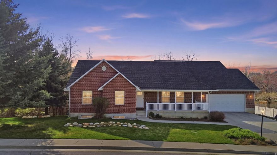 This beautifully updated home is set in a sought-after Birch and Smithfield canyon neighborhood and is what happens when comfort and style get together and build something amazing!  A large 1,200 sqft addition was completed in 2015, to include a kitchen with its own zip code.  We're talking enough space to host Thanksgiving, a baking show and a midlife crisis all at once.  Step outside onto the large deck and - you're in your own private retreat.  Mature trees surround the property like they are protecting something important.  There's even a peaceful vibes creek running through the backyard.  This home has space.  Like, actual space.  Enough for hosting, hiding from your kids, or finally starting that hobby you bought supplies for three years ago.  Updated throughout and a new roof in 2022, it blends modern touches with cozy canyon charm.  Close enough to civilization for groceries, far enough away to pretend you're off-grid and mysterious  the perfect mix of privacy and prestige.
