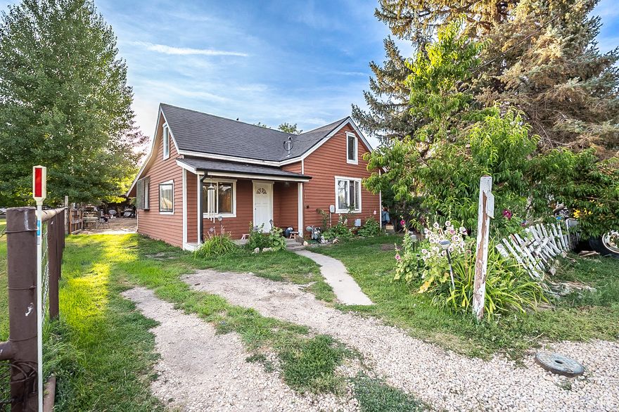 This charming wanship home features 3-bed, 1-bath home offers stunning mountain views, a spacious backyard for gardening or entertaining, and convenient parking. Perfectly situated on the historic rail-to-trail-enjoy peaceful walks, bike rides, or runs right outside your door. Only 20 minutes to Park City, world-class ski resorts, Rockport Reservoir, Weber River fishing, and premier dining at Blue Sky Ranch and High West Distillery. Quick access to I-80 and just 40 minutes to SLC International Airport. No HOA! Ideal as a first home, downsizing option, or investment rental. Call today for your private showing! Square footage figures are courtesy estimates from county records; buyer to verify.s. Buyer is advised to obtain an independent measurement.